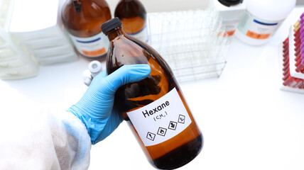 Hexane in bottle , chemical in the laboratory and industry
