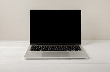 Fototapeta premium Laptop on the desktop. Laptop with empty space. MOCAP.