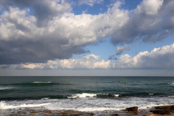 Rain clouds in the sky over the Mediterranean Sea in northern Israel.