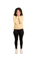 Fototapeta premium Young african american woman with curly hair cut out isolated shocked covering mouth with hands.