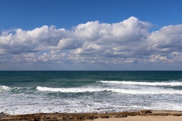 Rain clouds in the sky over the Mediterranean Sea in northern Israel.