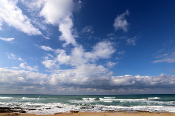 Rain clouds in the sky over the Mediterranean Sea in northern Israel.