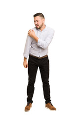 Full body adult latin man cut out isolated having a shoulder pain.
