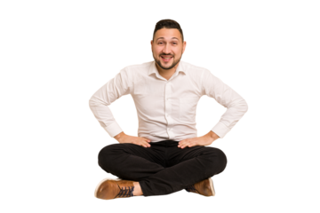 Adult latin man sitting on the floor cut out isolated confident keeping hands on hips.