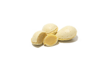 Spanish dessert, stuffed almonds, almond crisps filled with nougat cream. Isolated on white...