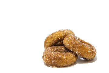 Lots of rosquillas, typical Spanish donuts. Isolated on white background. Spanish food concept.