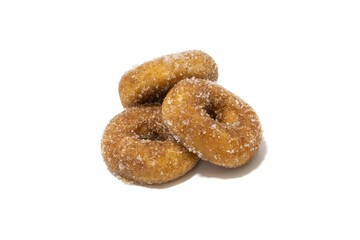 Fototapeta na wymiar Lots of rosquillas, typical Spanish donuts. Isolated on white background. Spanish food concept.