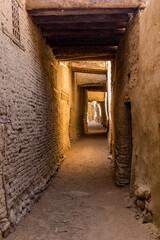 Fototapeta na wymiar Narrow alley in Al Qasr village in Dakhla oasis, Egypt