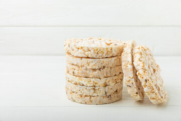 Rice cakes on a white texture background. Bread. Airy rice bread. dietary crispy round rice cakes. Place for text. Place to copy. Healthy food. dietary product.