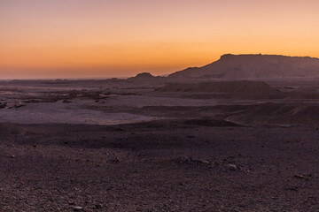 Sunset in a desert near Dakhla oasis, Egypt
