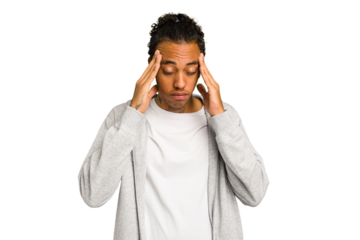 Young African American man isolated touching temples and having headache.