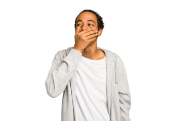 Young African American man isolated laughing happy, carefree, natural emotion.