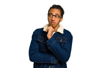 Young African American man isolated confused, feels doubtful and unsure.