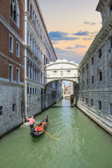 Beautiful view of the Bridge of sighs over one of the Venetian canals in Venice, Italy