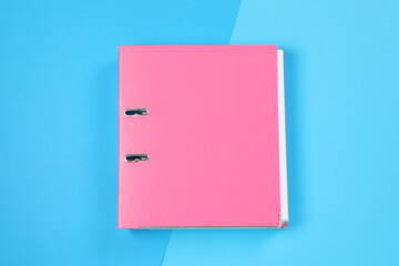 One office folder on light blue background, top view