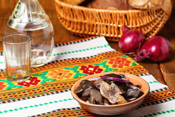 marinated mushrooms with spices and red onion.