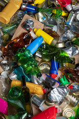 Plastic glass metal paper cardboard waste and recycling. Sorted recyclables materials. Waste...