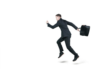 Side view of male manager running fast on studio