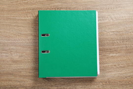 Green Office Folder On Wooden Table, Top View