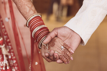 Indian couple's holding hands