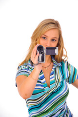 Studio shot of young blone woman with digital camcorder