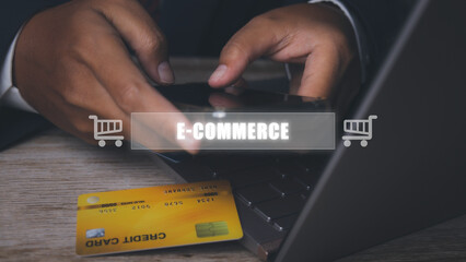 Businessman using mobile phone and credit card shopping online.