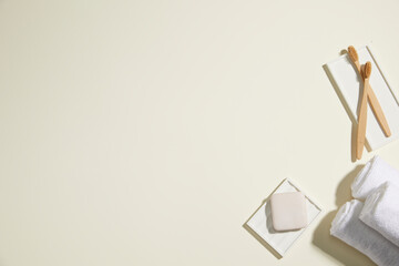 composition of bathroom object on light beige background. simple, copy space. top view.