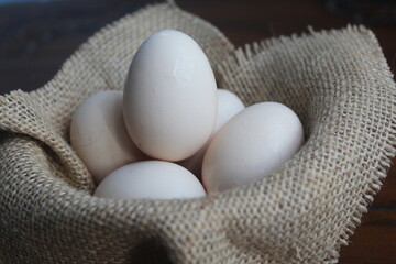 pile of a few raw free-range chicken eggs