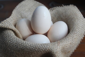 pile of a few raw free-range chicken eggs
