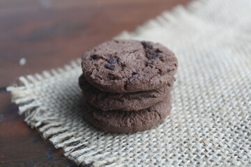 a pile of chocolate chip cookies sprinkled with chocochips