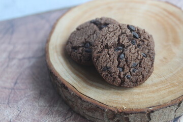 a pile of chocolate chip cookies sprinkled with chocochips