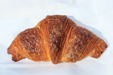 croissant on the white paper 
