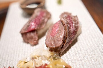 Japanese raw beef sushi with rice in Tokyo