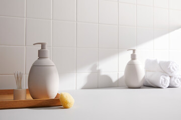 Obraz na płótnie Canvas bathroom object with morning window light on white tile wall. front angle and copy space