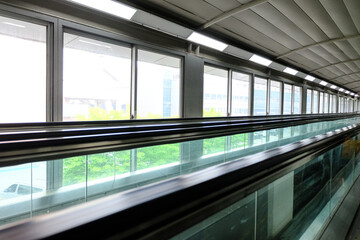 Fototapeta na wymiar moving escalator in a building
