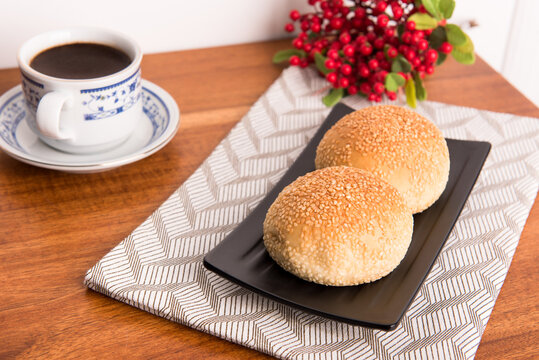 Kompyang bread or Kompia or Guang Bing, a typical Chinese bread that is popular in Indonesia, both filled with meat and empty. Its signature with a sprinkling of sesame on top