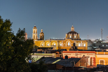 Beautiful night view of the city of Puebla in Mexico. San Juan de Dios church.