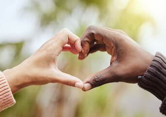 Love, a couple and heart hand sign with nature, man and woman together with affection and...