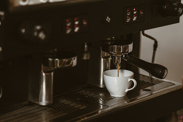 espresso machine in coffee shop counter offering freshly brewed coffee. coffee maker concept.