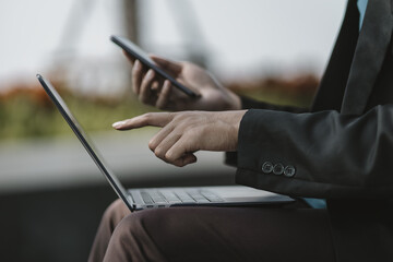 Employees fired or resigned from the company use laptop to find a job..Unemployed, hiring job, quitting job concept.