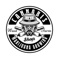 Fototapeta premium Stoner head in bucket hat and two crossed weed joints vector emblem, badge, label or logo. Illustration in vintage monochrome style isolated on white background
