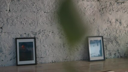 Cinematic modern art home decorations. Photo frames. Urban style home wall design.