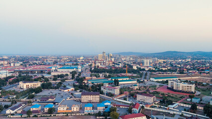 Fototapeta na wymiar Grozny, Russia. Panorama of the city center from the air. Time after sunset, Aerial View