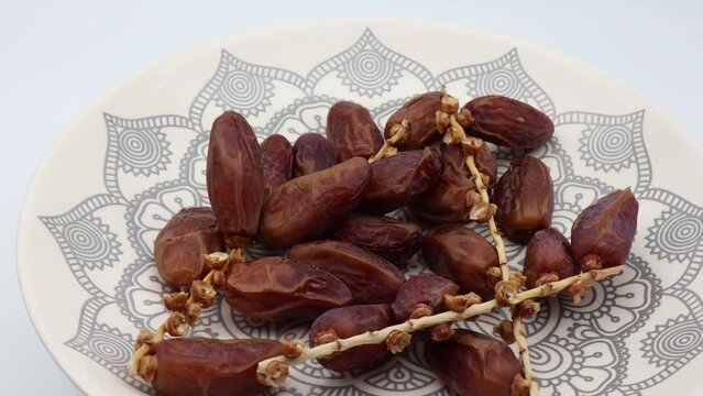 Organic Deglet Nour dates from Tunisia rotate in a circle. Video 4K
