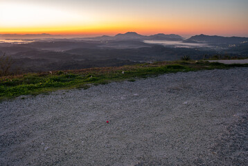 Backplate for CGI showing a gravel parking lot at a viewpoint on the island of Corfu during a...