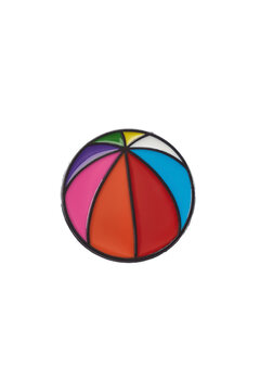Close-up shot of a ball pin in the colors of the rainbow pride flag. An enamel LGBT lapel pin is isolated on a white background. Front view.
