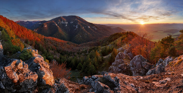 Beautiful sunset over autumn forest with big mountain panorama landscape in Slovakia