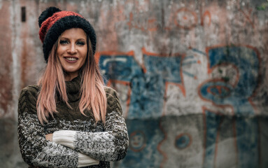 urban woman with arms crossed on the street