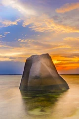 Fotobehang Lonely rock in the sea in Seychelles © Fyle