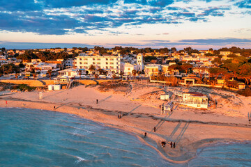 Tramonto a marina di pulsano visto dal drone in inverno,  puglia, taranto, italy, salento